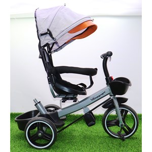 سه چرخه فلزی با سایه بان رنگ طوسی